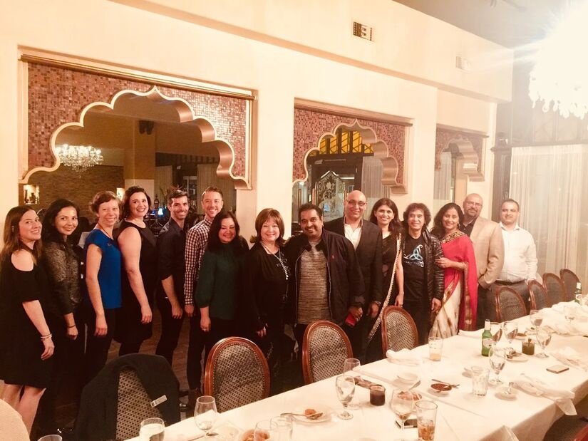 Group dining celebration at Royal Indian, an Indian cuisine restaurant offering authentic Indian food, vegetarian options, vegan food, and classic tandoor dishes.